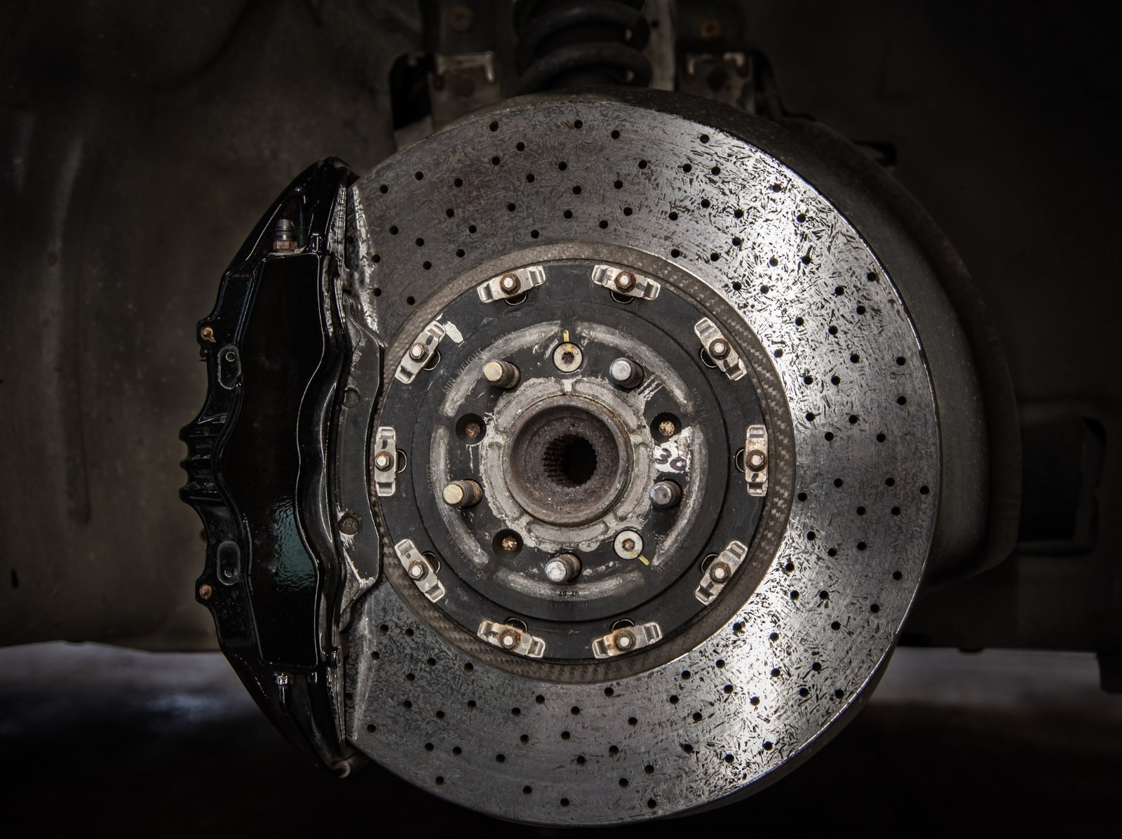 Structural Optimization and Weight Reduction of Brake Calipers